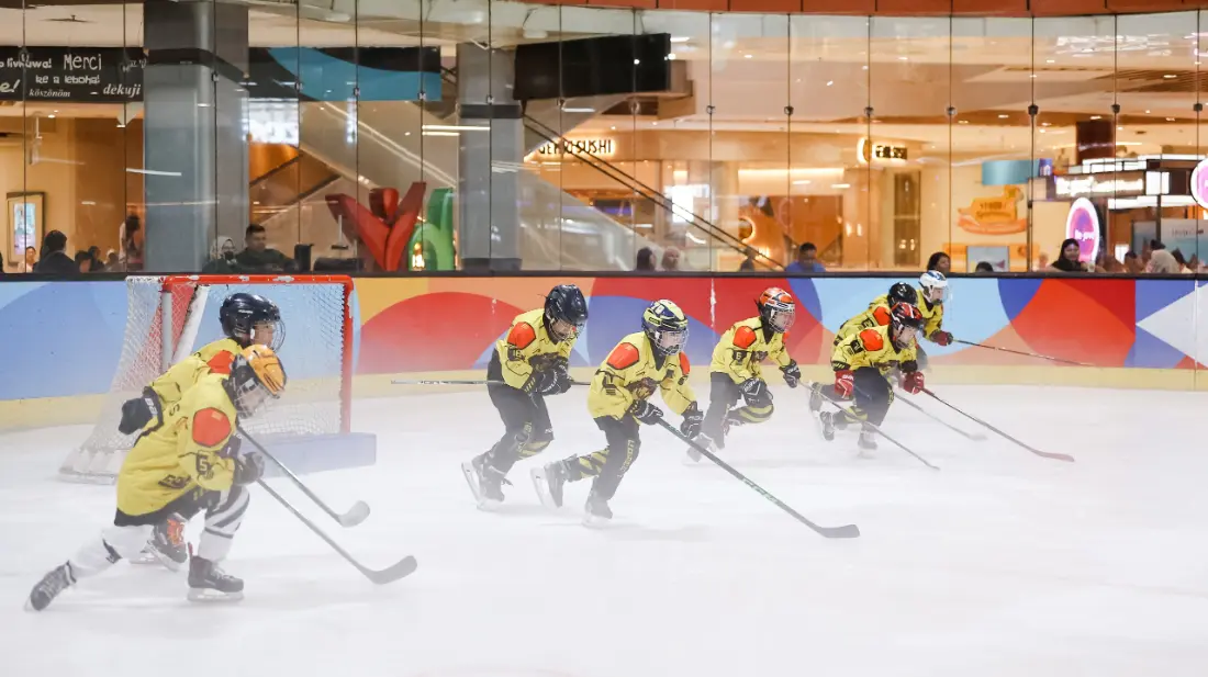 Golden Cobras players in a full-ice group practice