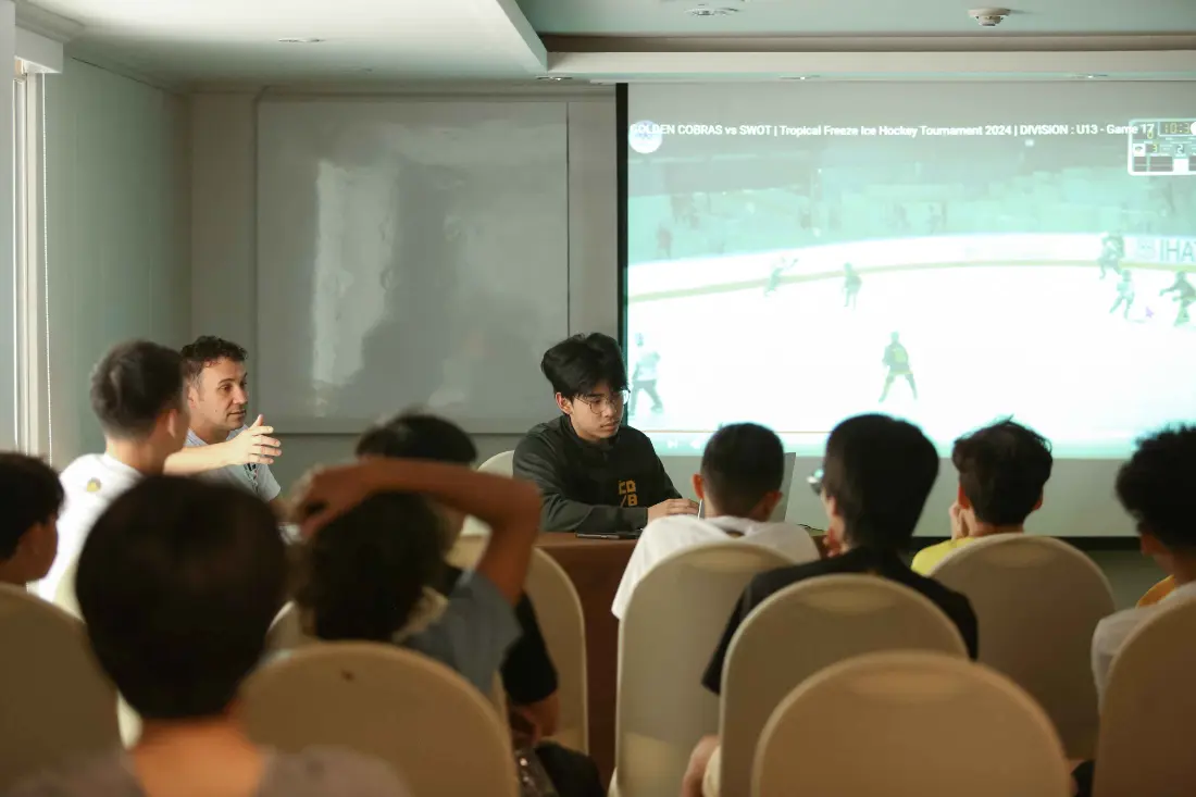 Players in a video coaching session