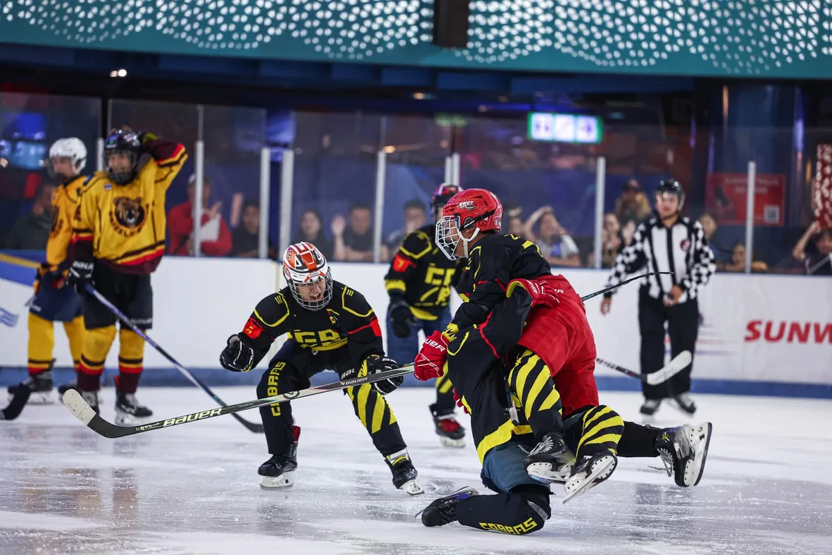 Golden Cobras U15 players celebrating a goal at Frozen Faceoff 2026